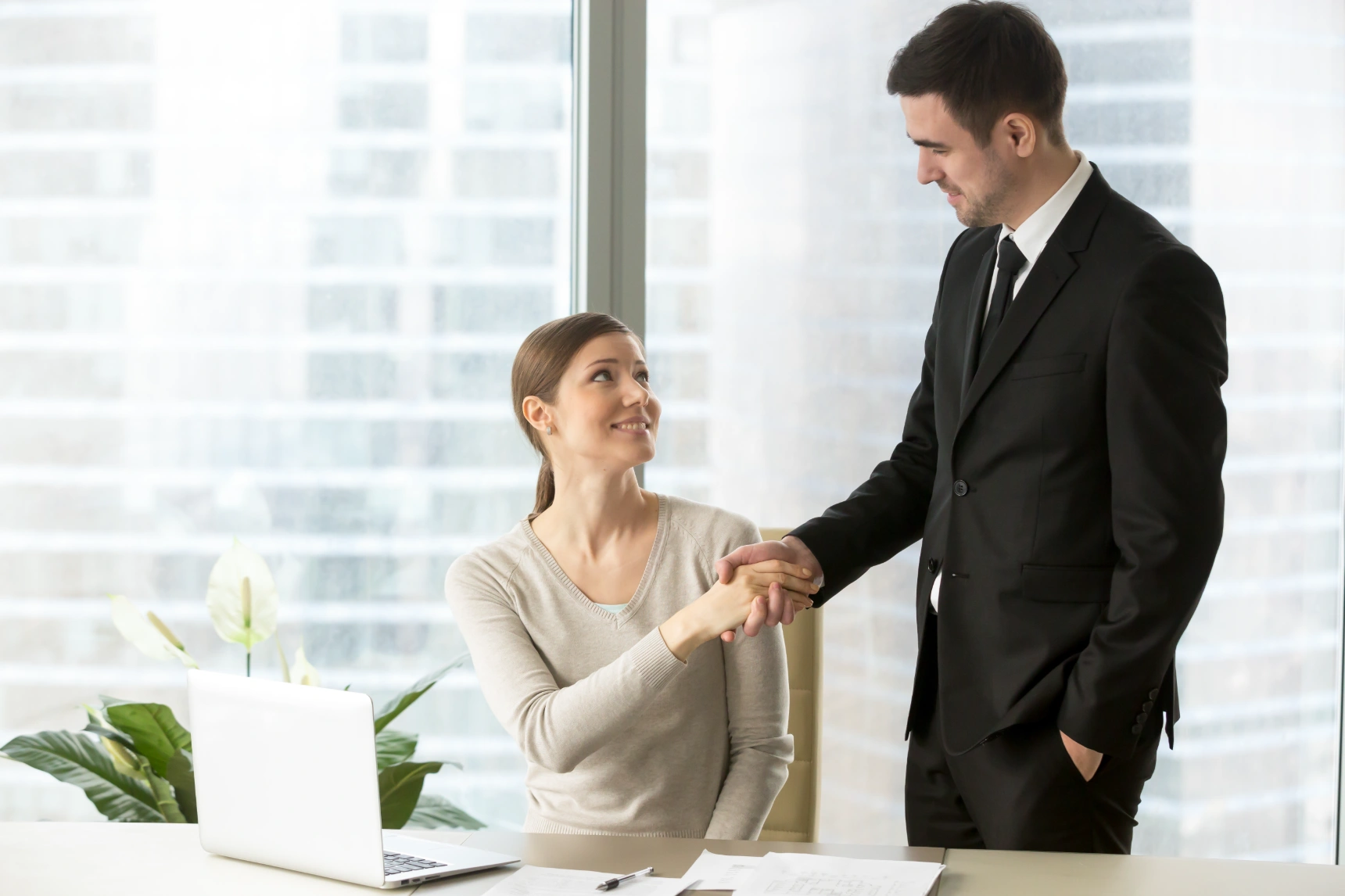 colleagues-congratulating-each-other-with-success