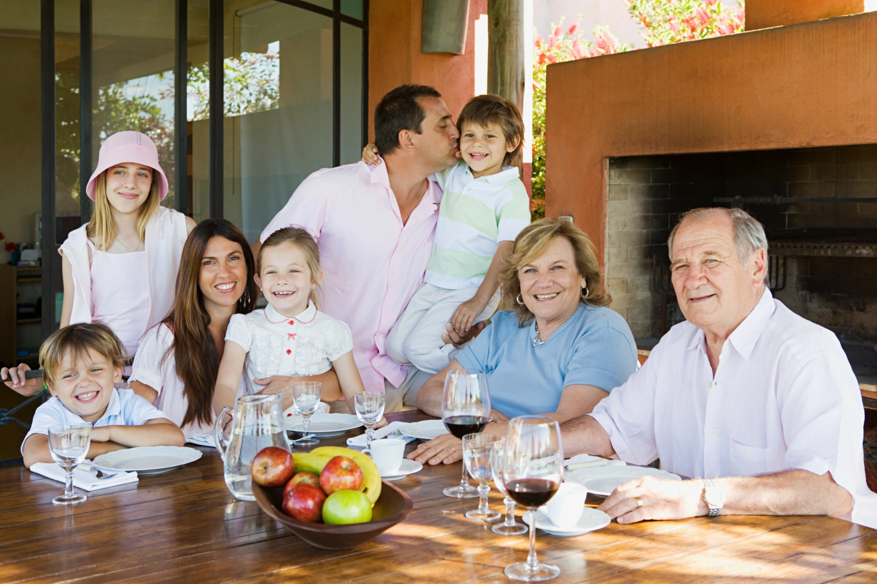 family-enjoying-a-sunny-outdoor-meal-together