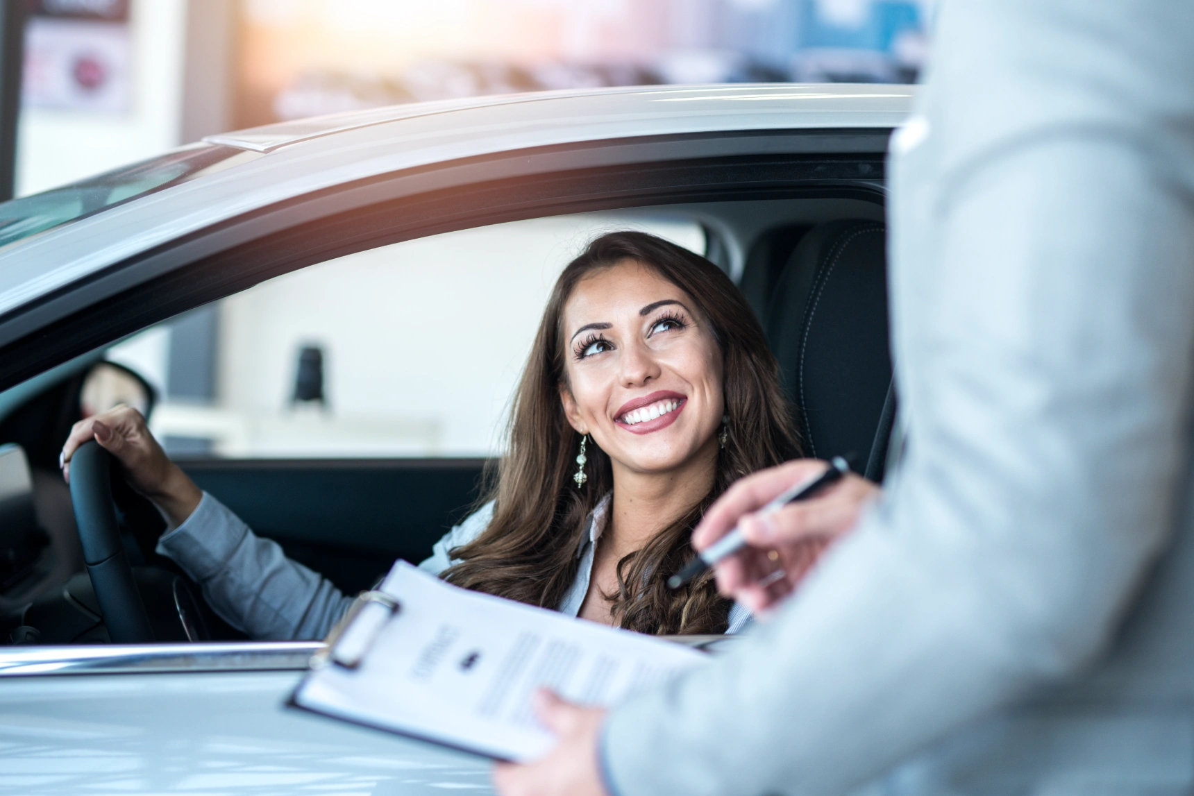 happy-customer-buying-brand-new-car-local-car-dealership